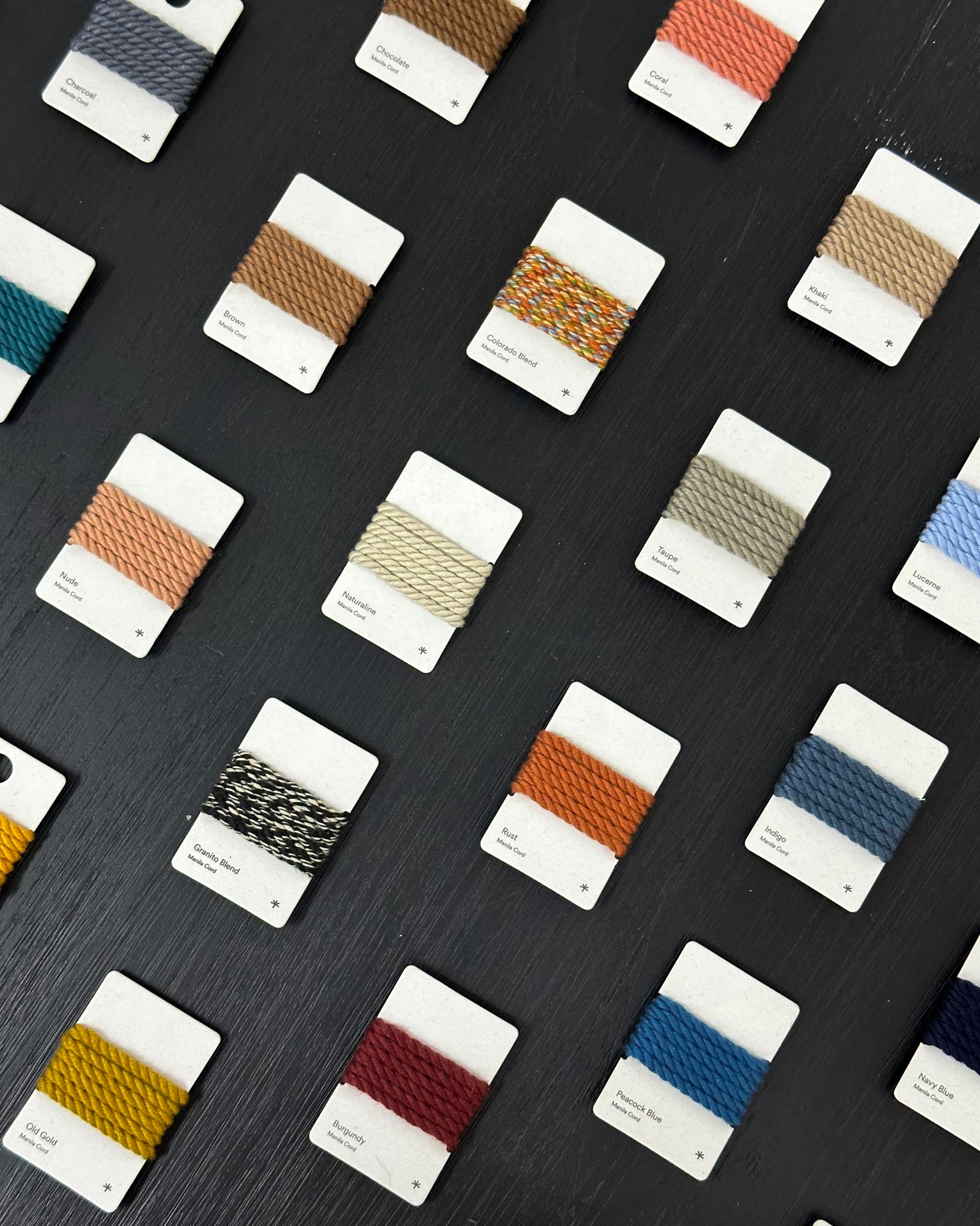 Samples of woven cord colors by MasayaCo. Customers can pick the color and weaves on their teak chairs